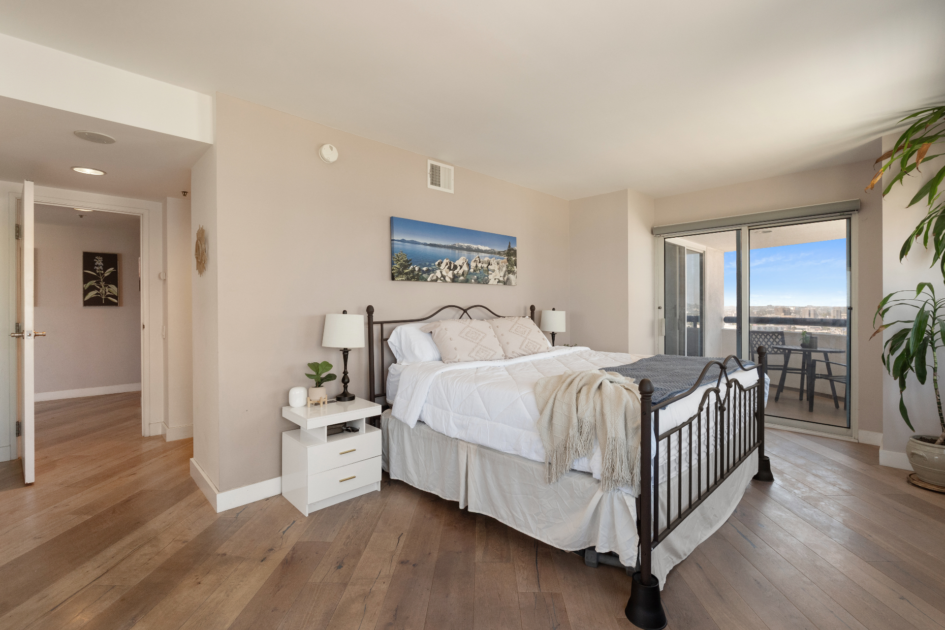 Primary Bedroom with Balcony Access & Ocean Views